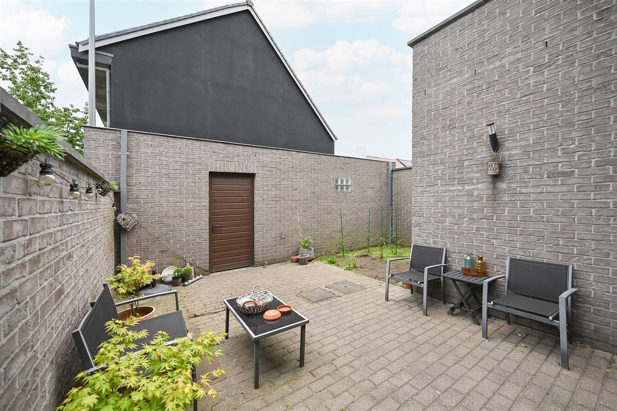 Gelijkvloersappartement met tuin en fietsenberging foto 12