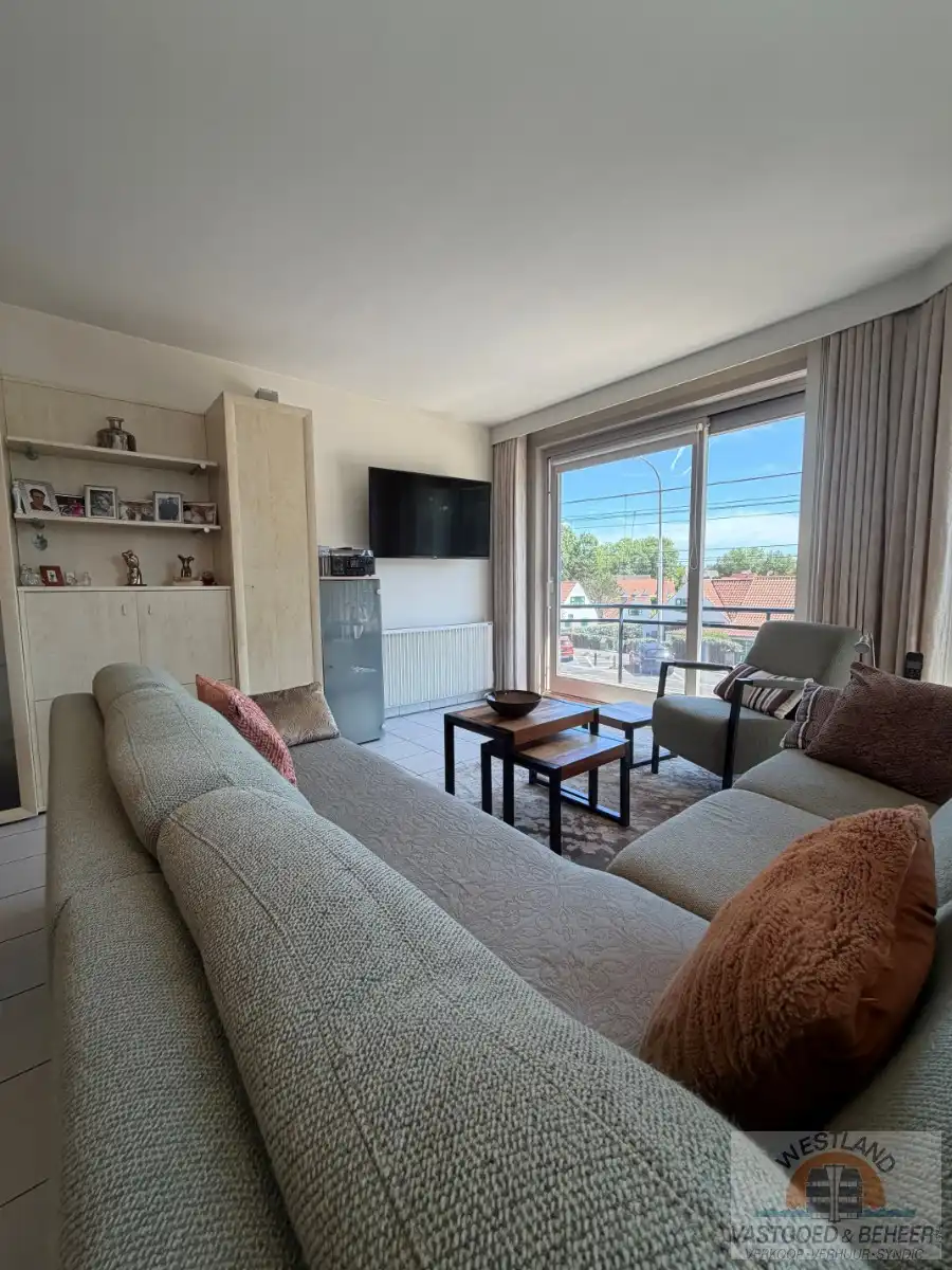 Lichtrijk hoekappartement met 1 slaapkamer foto 4