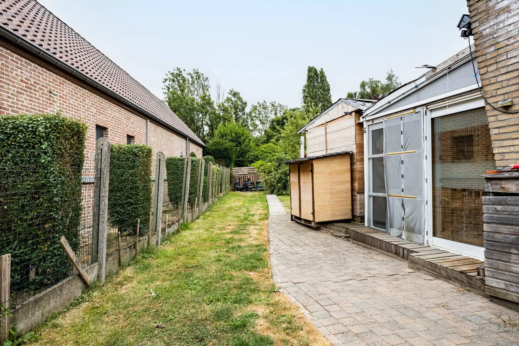 Leuke half-open bebouwing met grote tuin! foto 15