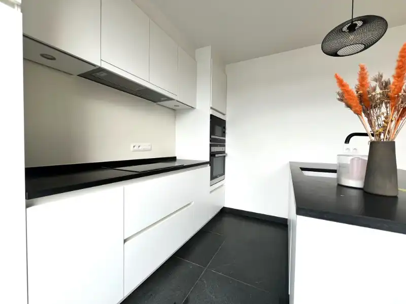 Luxueus app met 2 slpkms en staanplaats voor wagen foto 7