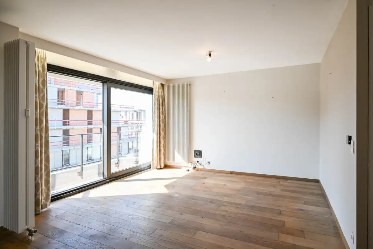 Ruim 1 slaapkamer appartement met zijdelings zeezicht en aankoopmogelijkheid tot een dubbele garage! foto 5