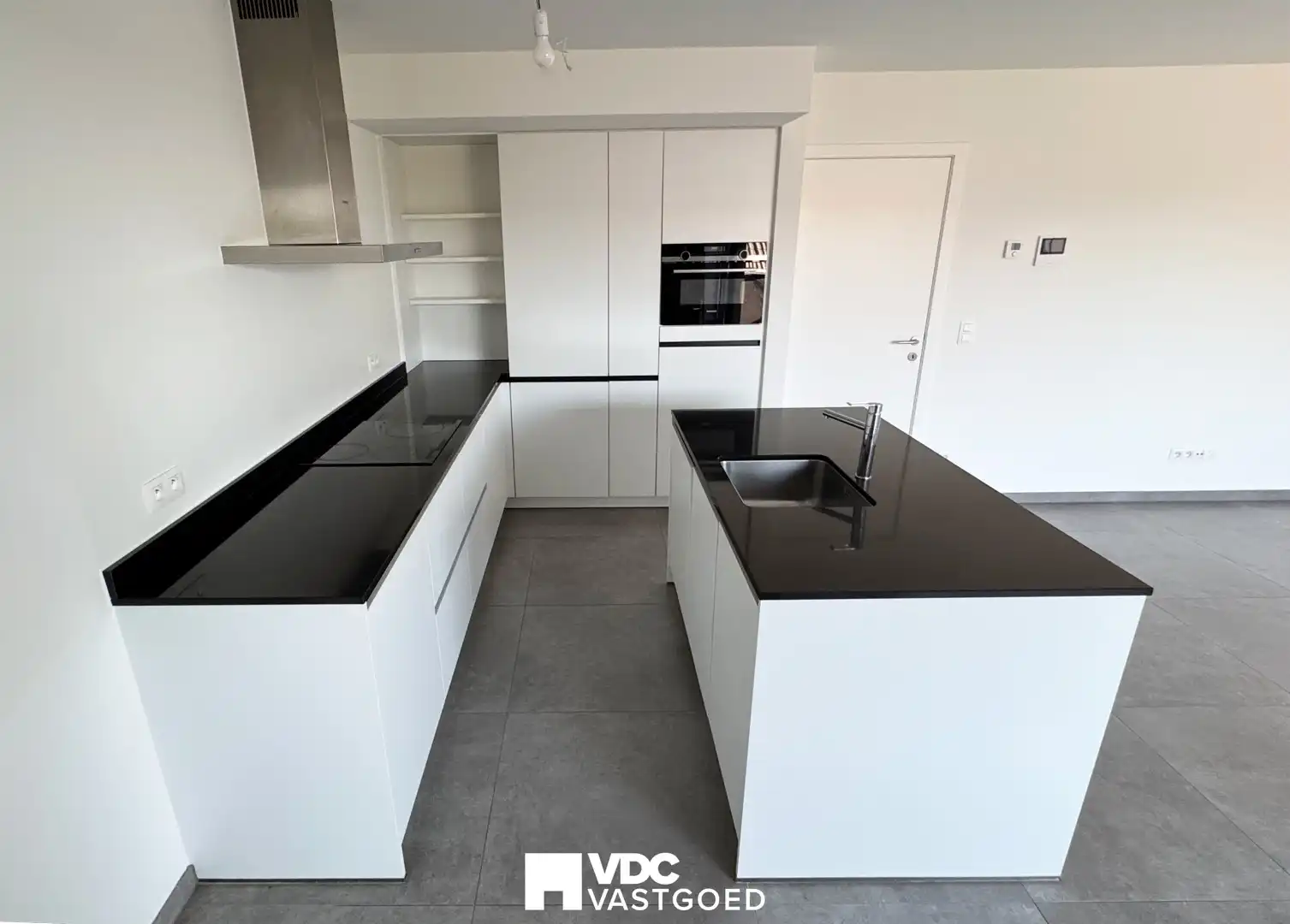Ruim en modern duplex-appartement met 3 slaapkamers en twee parkeerplaatsen foto 5