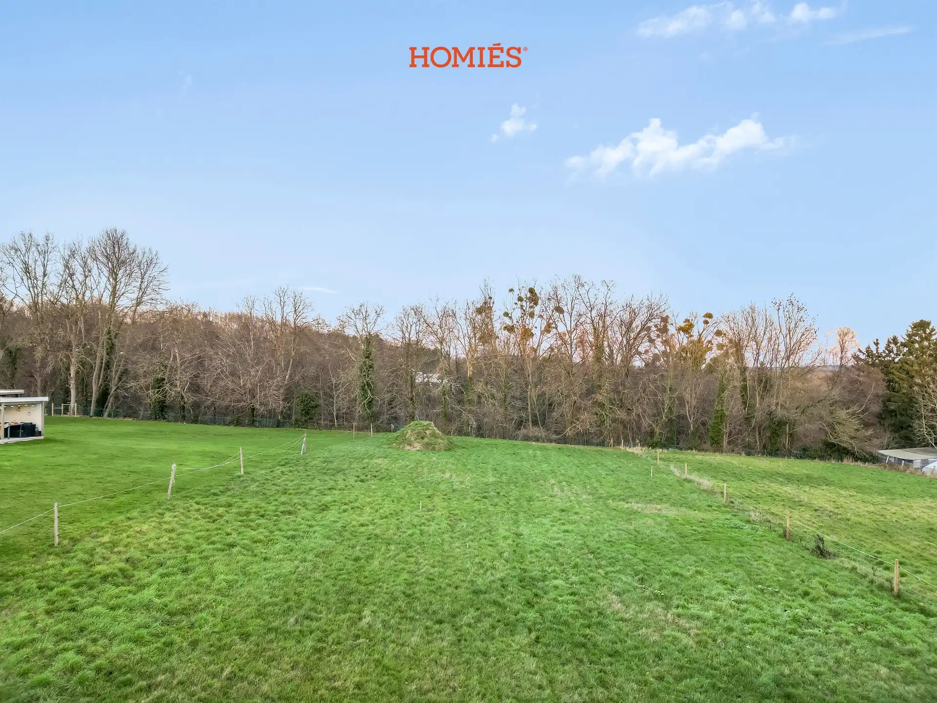 Ruime bouwgrond in groene omgeving foto 3