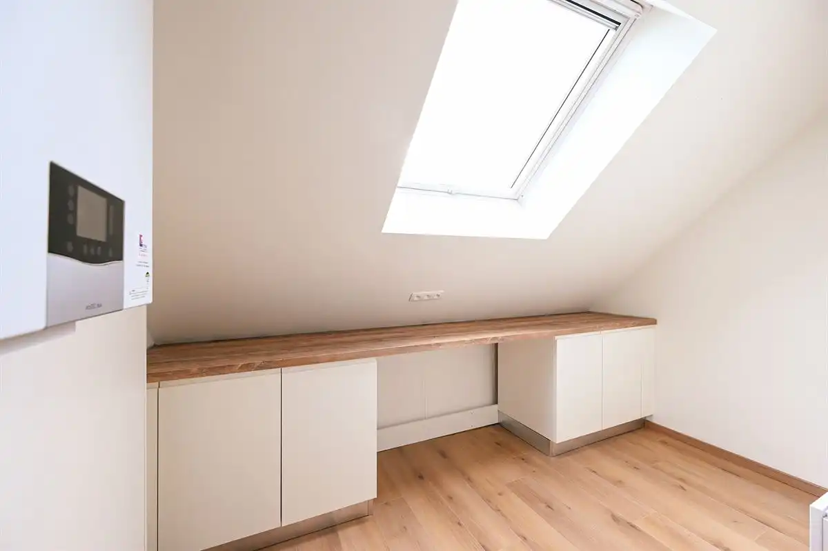 Uniek dakkappartement met zeer grote garage foto 16