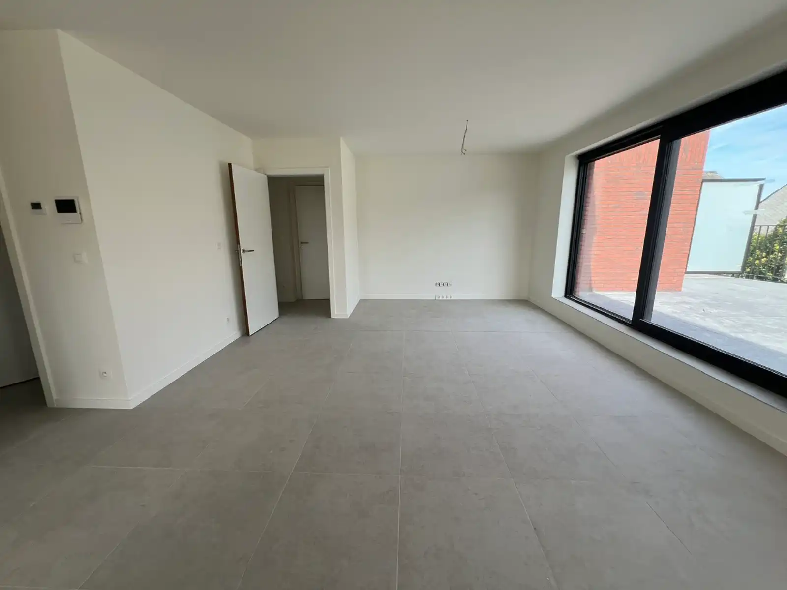 Nieuwbouwapp met 1slpk, ZW terras (26m²) en parking foto 9