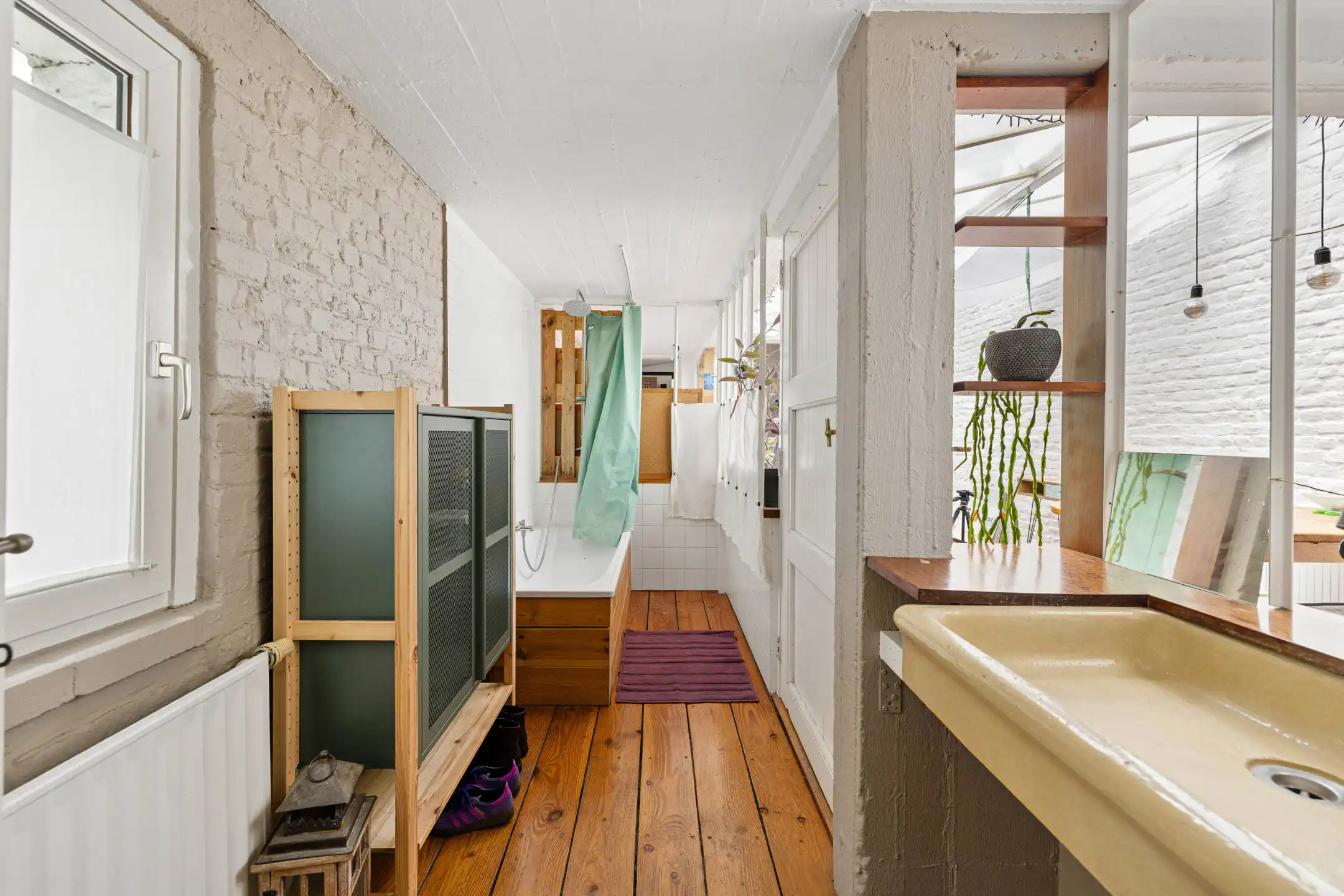 Begane grond 2 slaapkamers van ± 126 m² met tuin foto 17