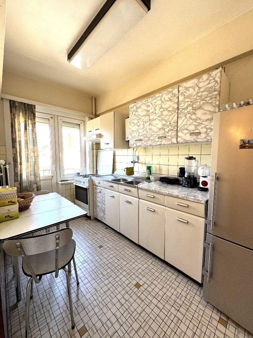 Ruim appartement met veel potentieel op toplocatie in Vilvoorde. foto 12