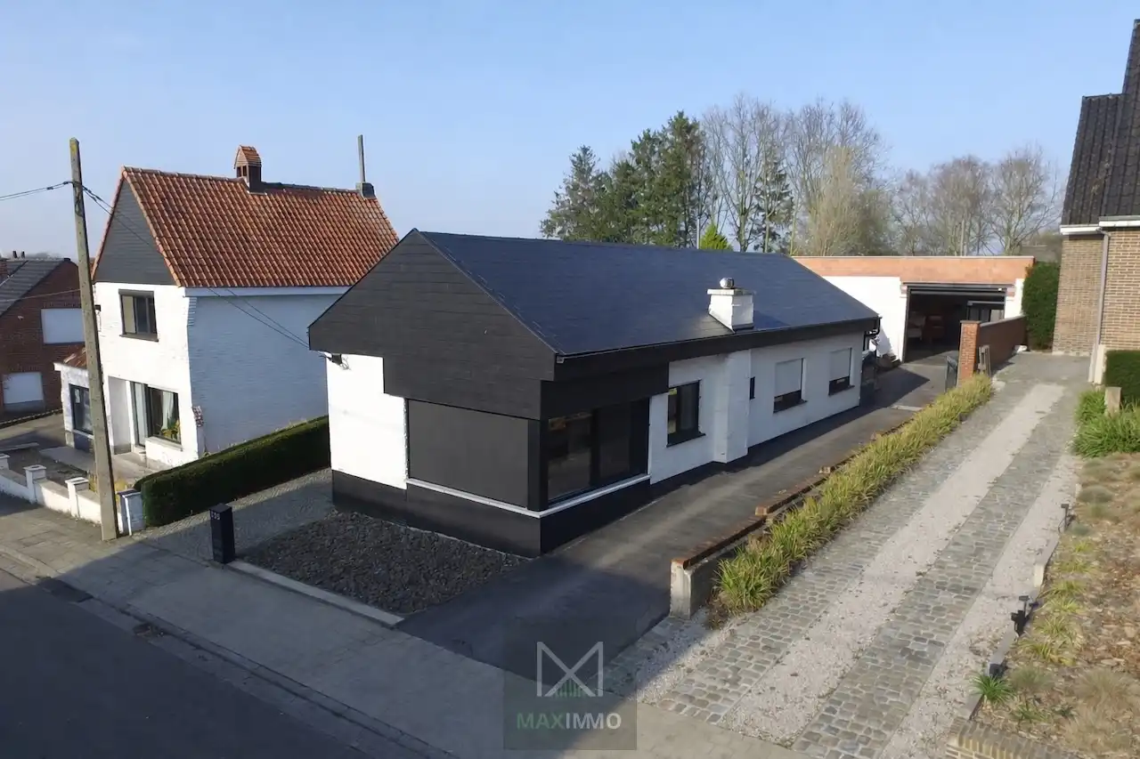 Gelijkvloerse bungalow met loods van 180 m² in het centrum van Marke foto 31