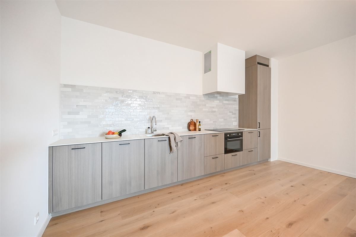 Stijlvol 1 slaapkamer appartement  in het Zilverkwartier op de grens Mortsel/Berchem foto {{pictureIndex}}
