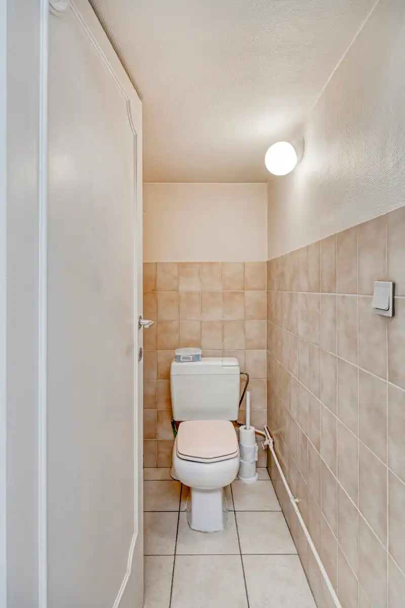 Rijwoning met 2 slaapkamers, inrichtbare zolder & grote tuin foto 11