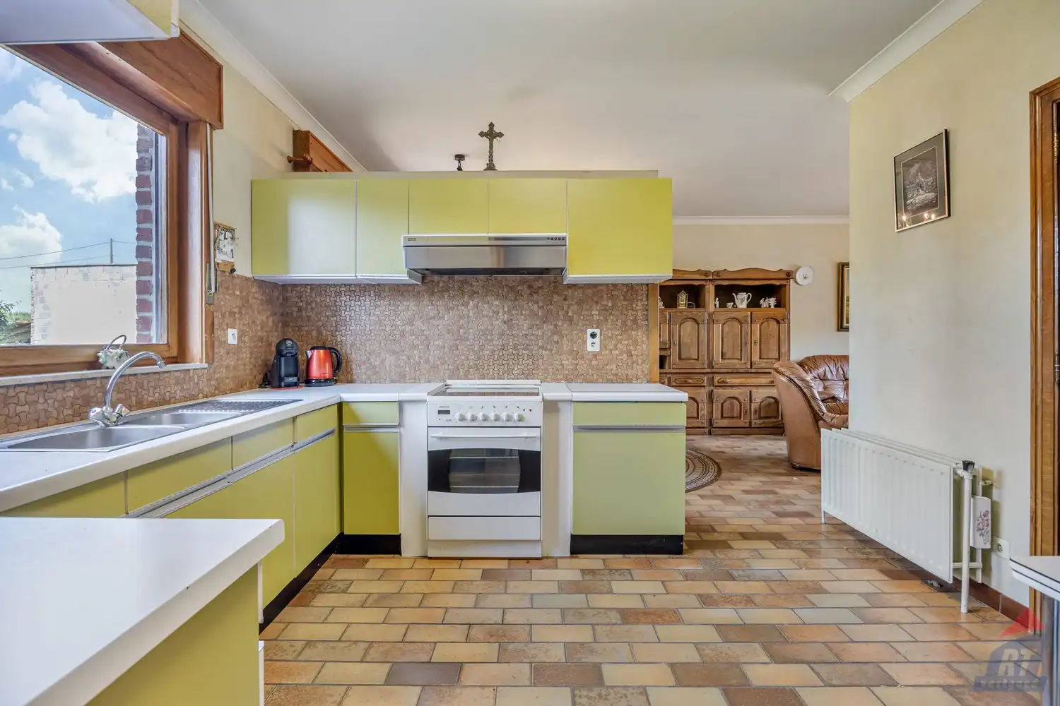 Rustig gelegen halfopen bebouwing met ruime tuin en tal van renovatiemogelijkheden foto 9