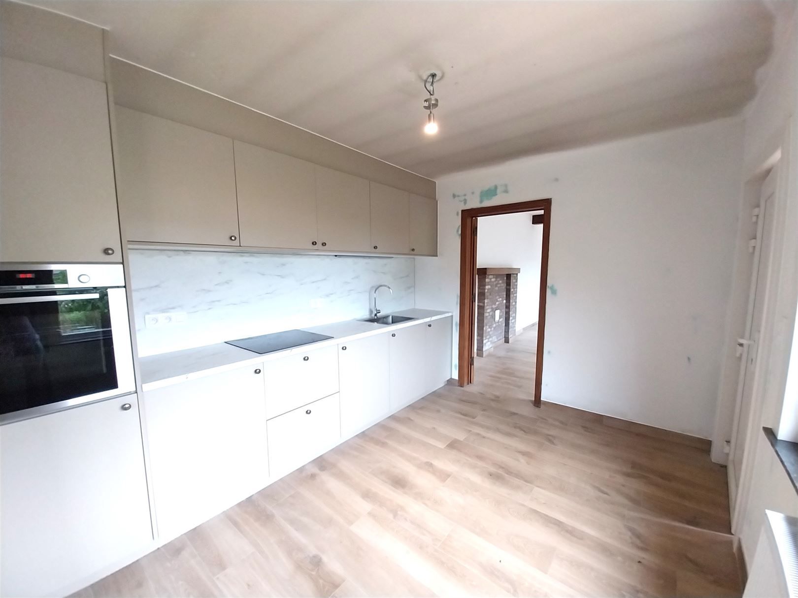 TE HUUR: gerenoveerde woning met 3 slaapkamers te Paal! foto 7