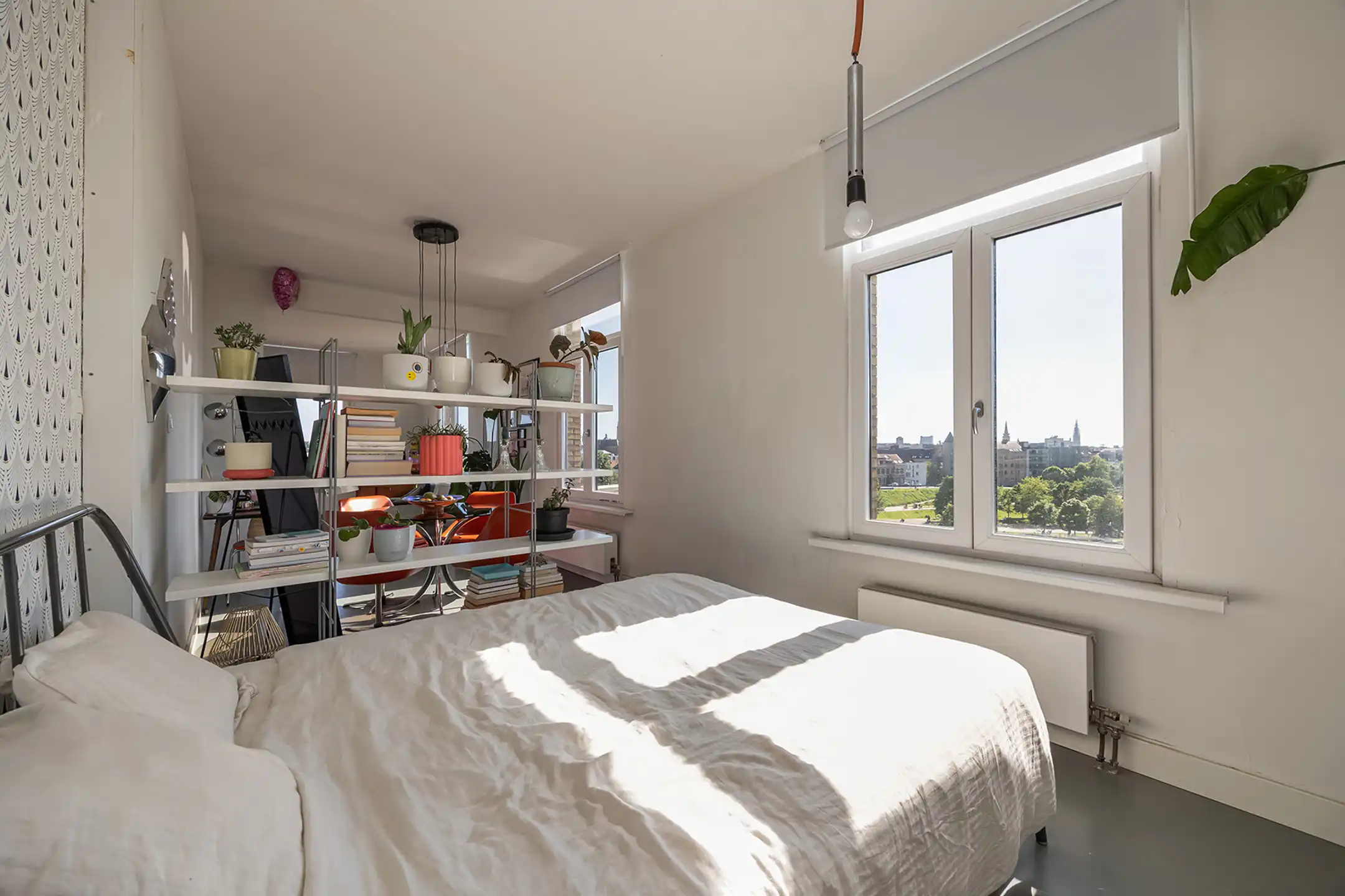 Lichtrijk hoekappartement met open zicht aan Damplein foto 7