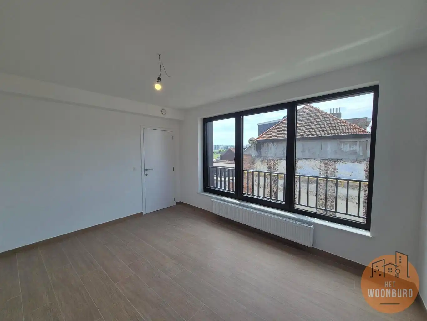 Nieuwbouw duplex met 2 slpks, bureel, terras en kelder foto 6