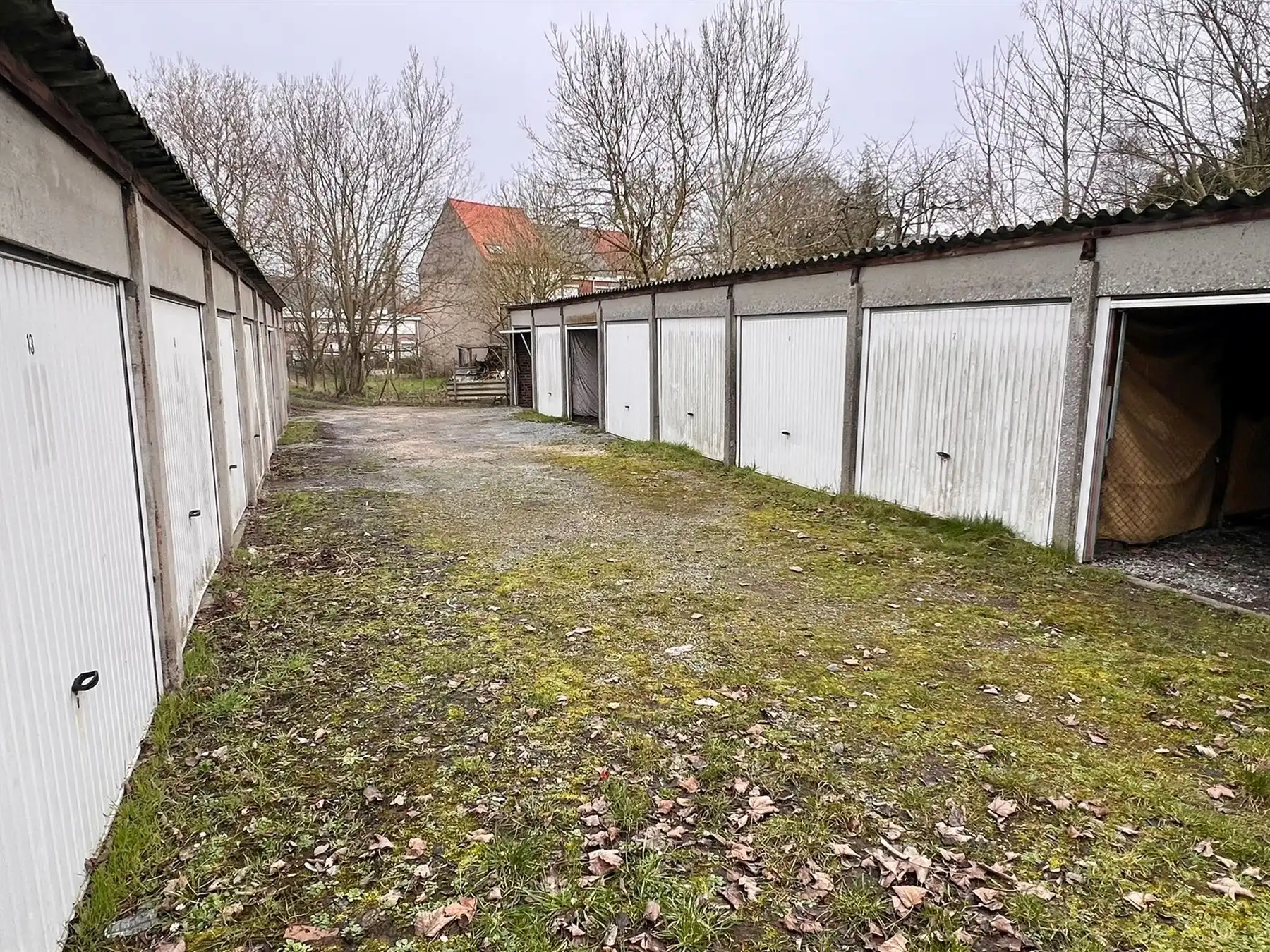 Ideale investering bouwgrond met 20 achterliggende garageboxen foto 10