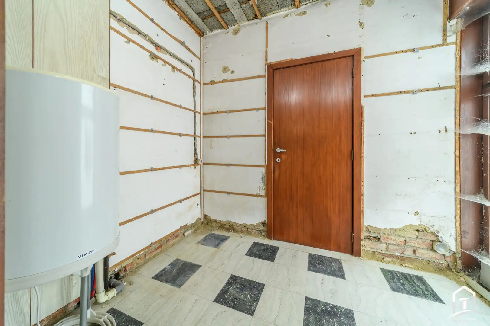 bungalow met achterliggende bouwgrond in het groene Hofstade foto 10