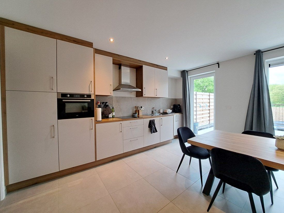 Mooi ruim energiezuinig gelijkvloers appartement te Dilsen-Stokkem foto 7