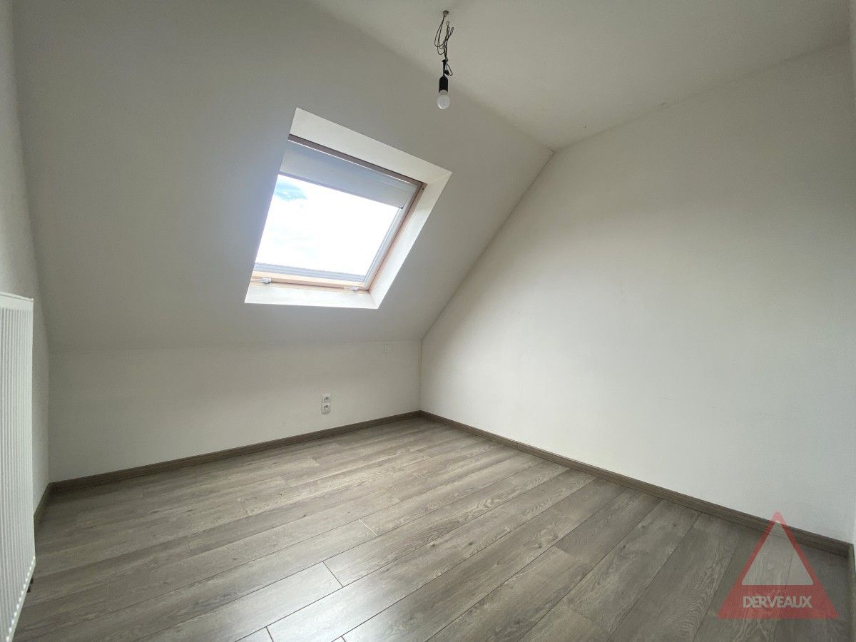 Roeselare – Instapklare gezinswoning met zonnige tuin en carport foto 12