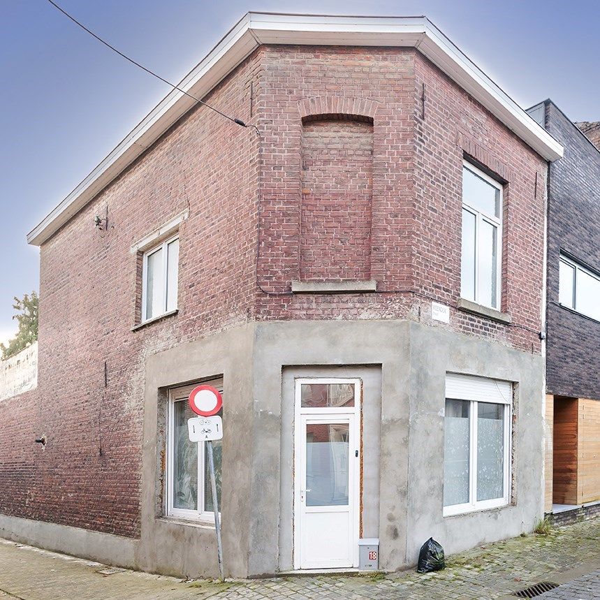 Hoekwoning met 3 slaapkamers en 2 badkamers in centrum foto 2