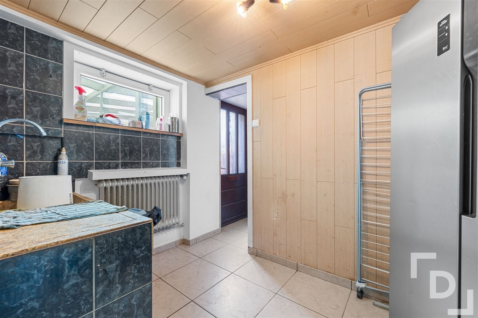 Gezinswoning met ruime tuin in hartje Krombeke! foto 14