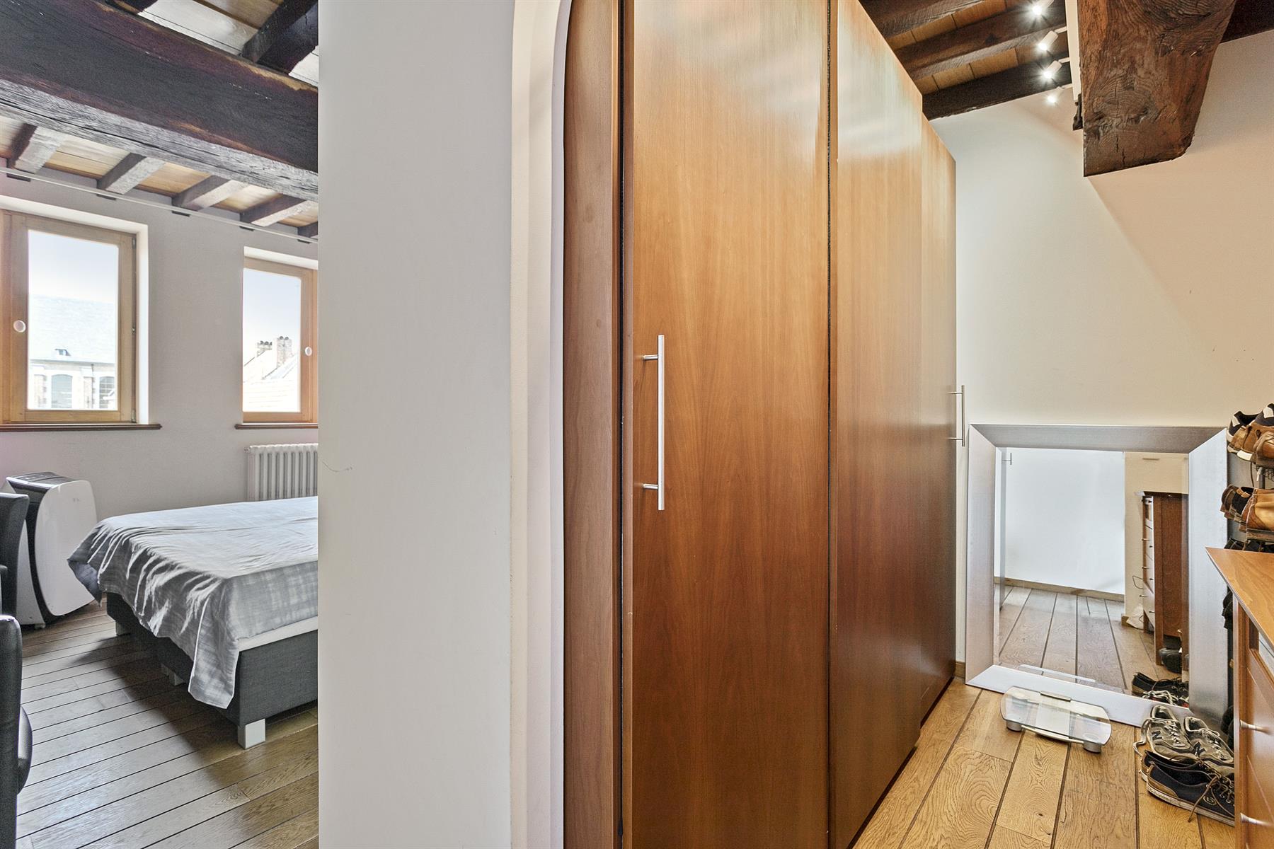 Authentiek triplex app. in stadscentrum met 4 slpk foto 18