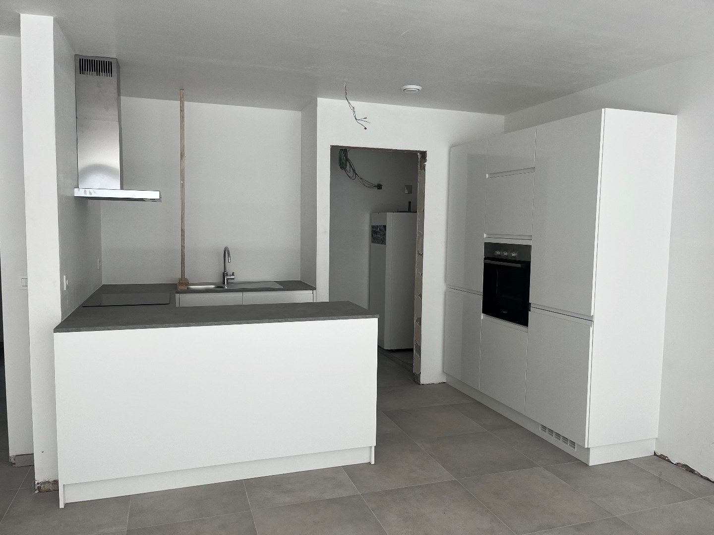 Gelijkvloers appartement met tuin in hartje Sijsele! foto 4