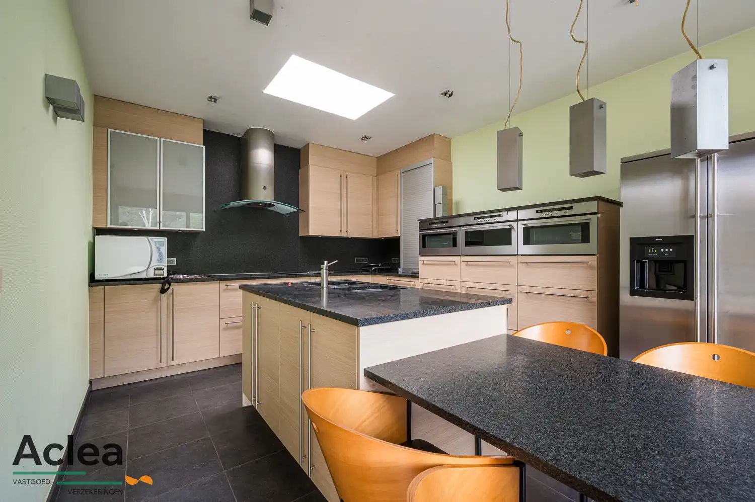 Uitzonderlijk ruime woning met veelzijdige mogelijkheden foto 14