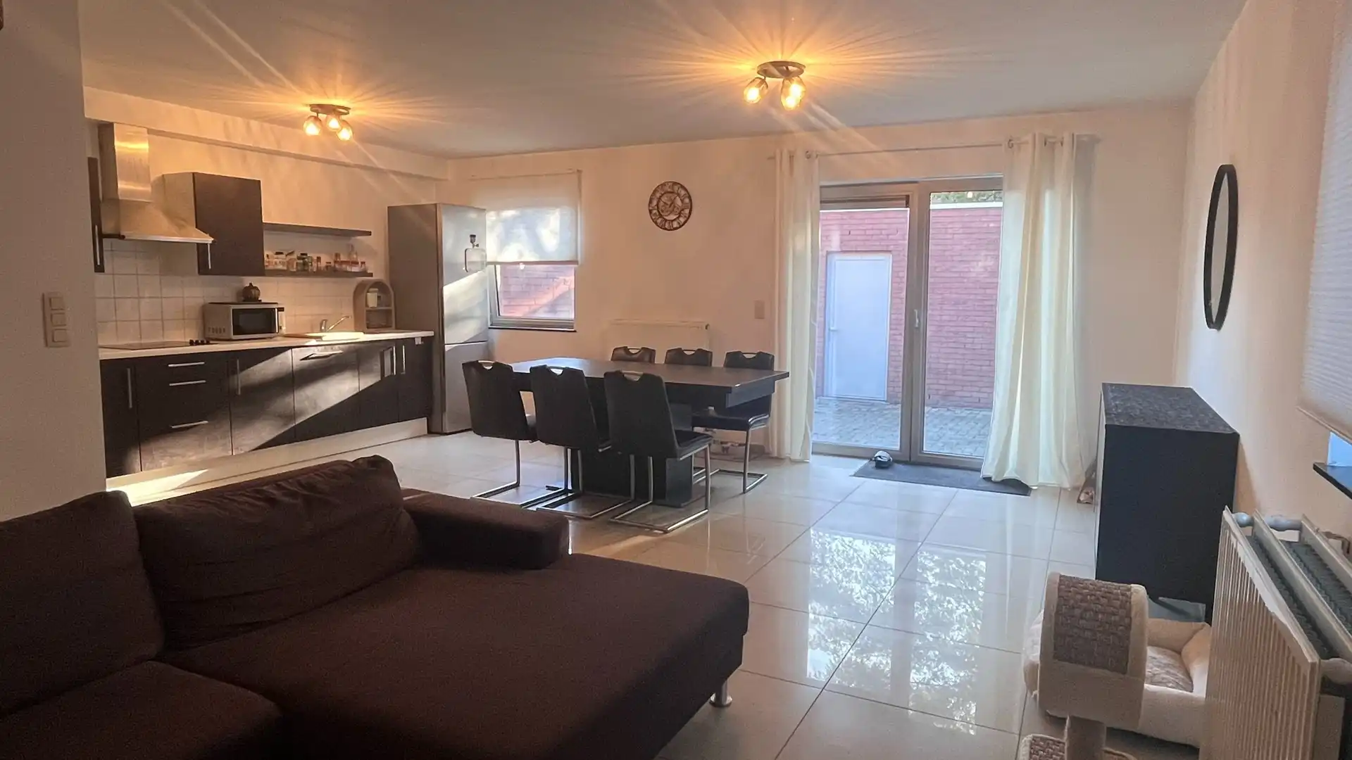 Gelijkvloers appartement met terras en private garage foto 4