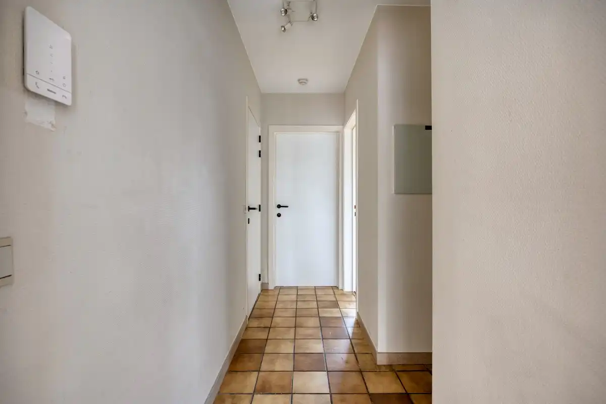 Opbrengsteigendom met 3 appartementen en 7 garages foto 6
