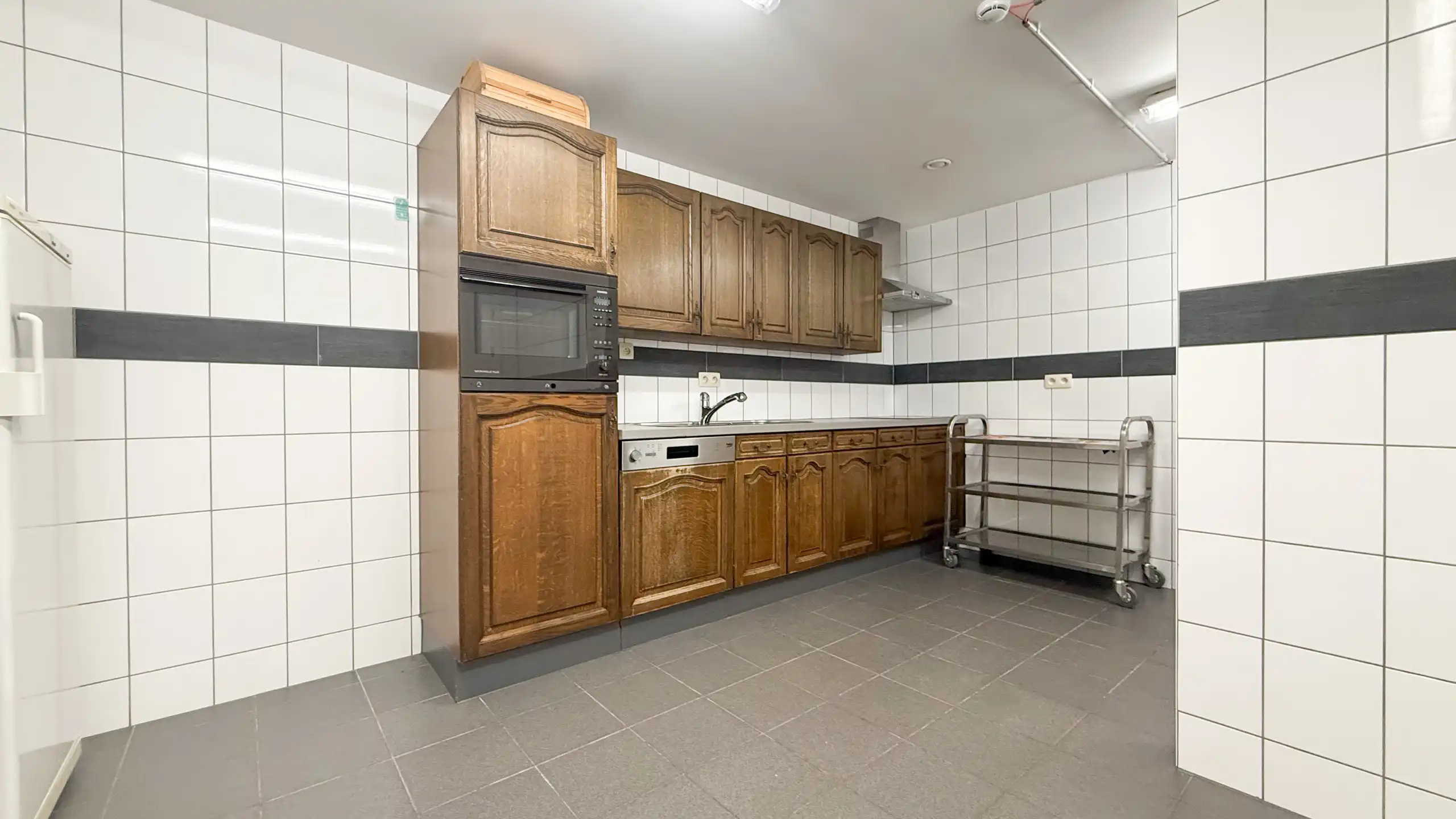 Veelzijdig investeringspand met 10 kamers, lift en kelder! foto 16