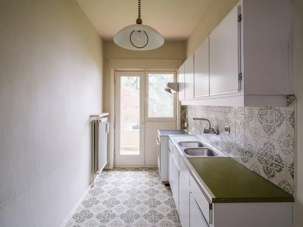 Hoekappartement met veel potentieel in residentie ‘Carlton’ nabij Gent foto 7