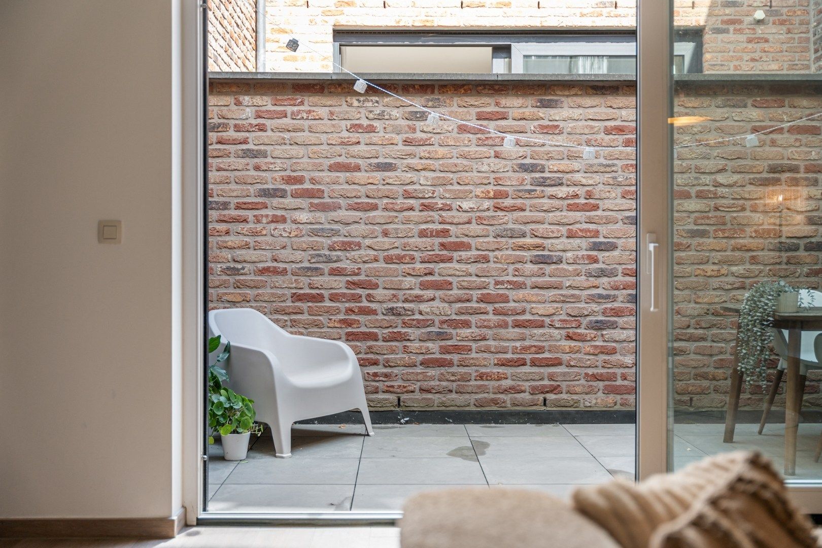 Recent, hoogwaardig afgewerkt gelijkvloers appartement, met terras en inpandige garage, in het centrum van Maaseik!  foto 27