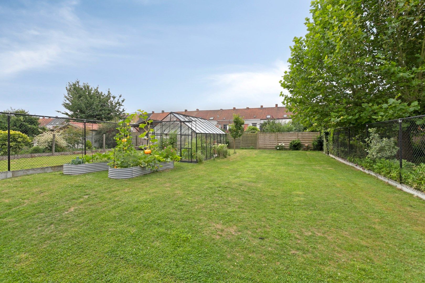 Prachtige instapklare woning met 3 slaapkamers en grote tuin! foto 13
