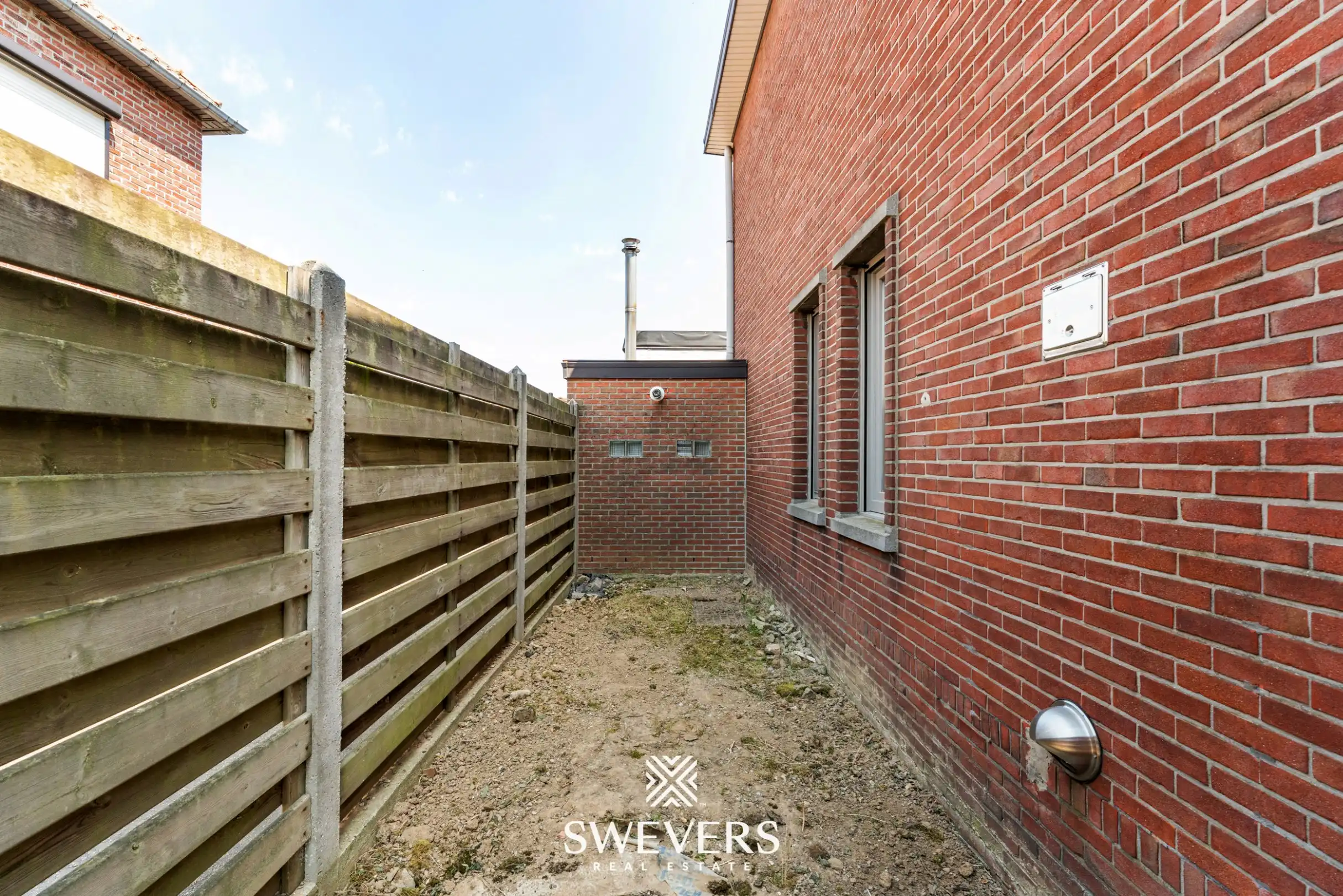 Instapklare gezinswoning met grote tuin in Bilzen-Hoeselt foto 27