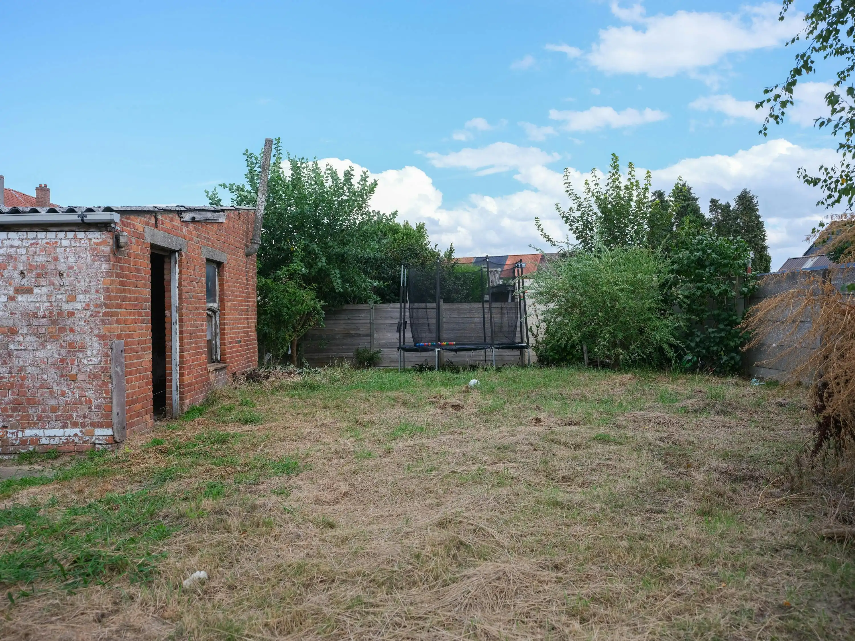 Huis te koop met veel potentieel en tuin te Wondelgem foto 21