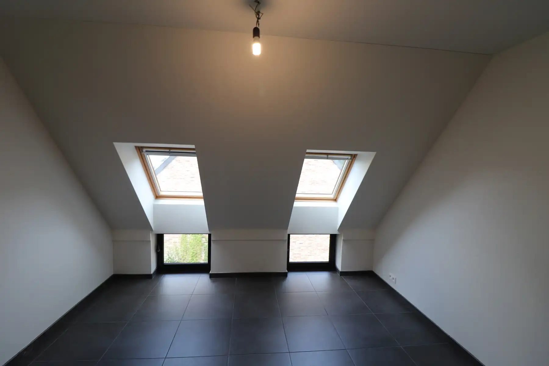 Een recent duplexappartement op de tweede en op de dakverdieping - met terras en garage. foto 5