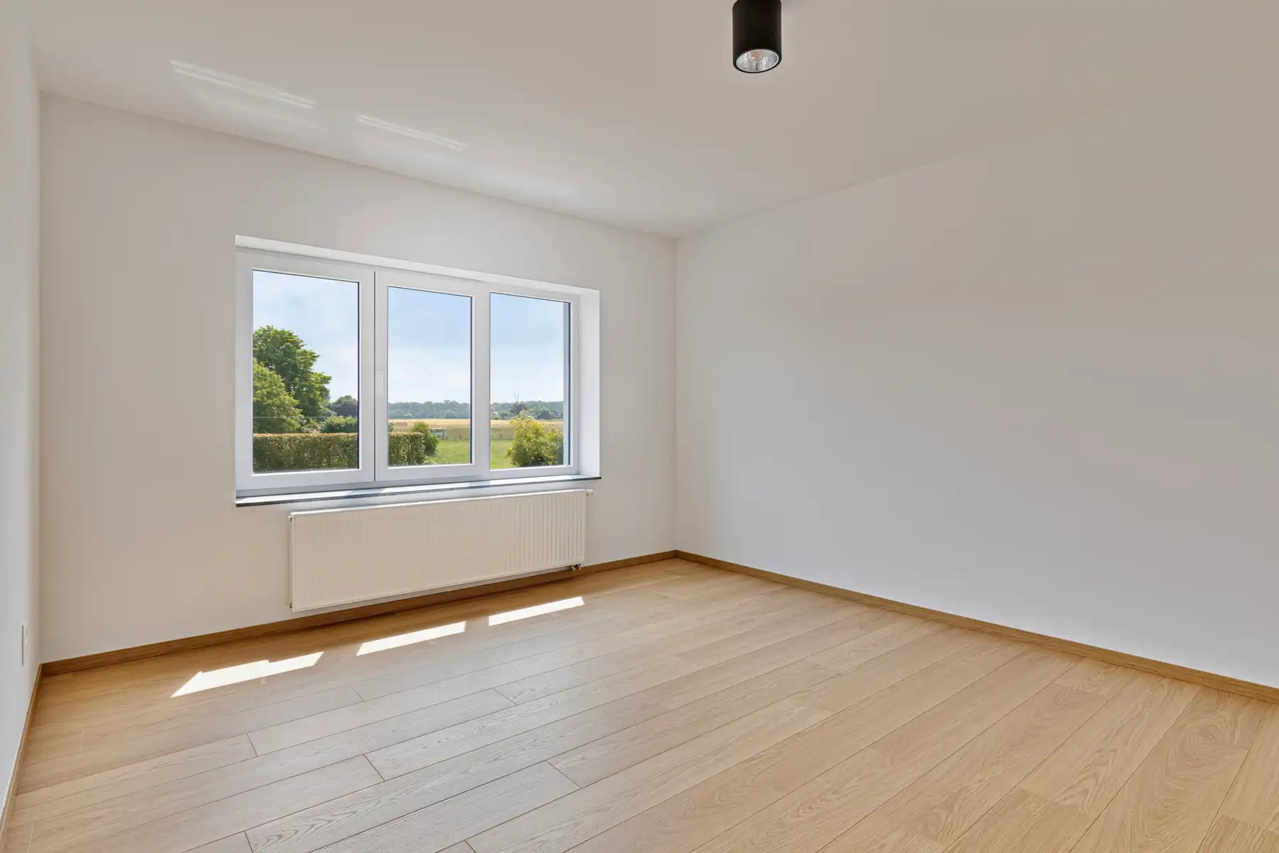 Duplex appartement met 4 slpk en 2 badkamers, tuin en garage foto 9