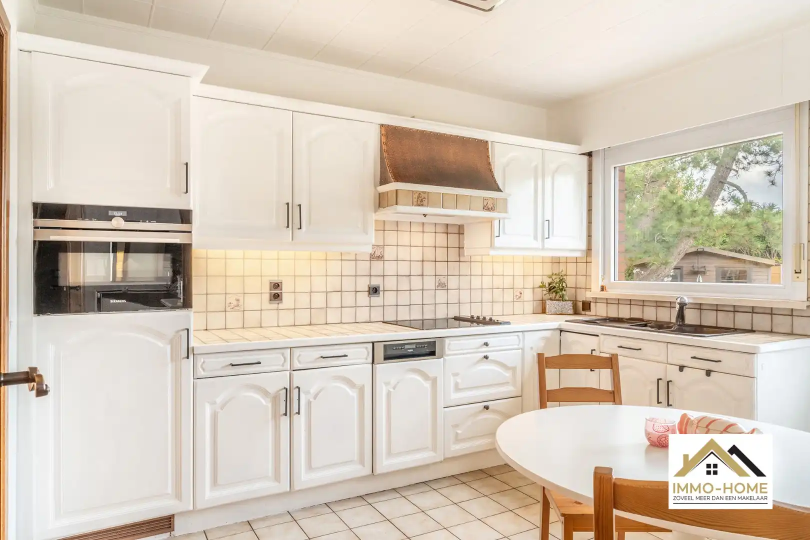 Vrijstaande bungalow met een ruime grond op een topligging!  foto 12