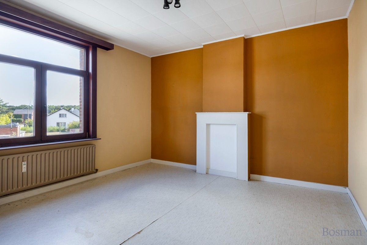 Halfopen bebouwing met 5 garageboxen te koop in Ham foto 13