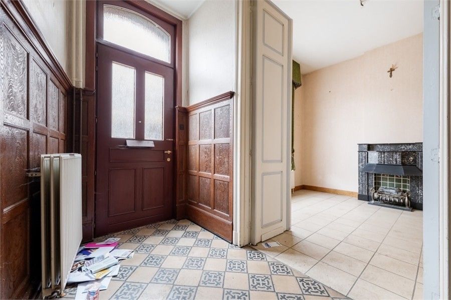 TE RENOVEREN STADSWONING MET VEEL POTENTIEEL IN HET STADSCENTRUM VAN SINT-TRUIDEN foto 4