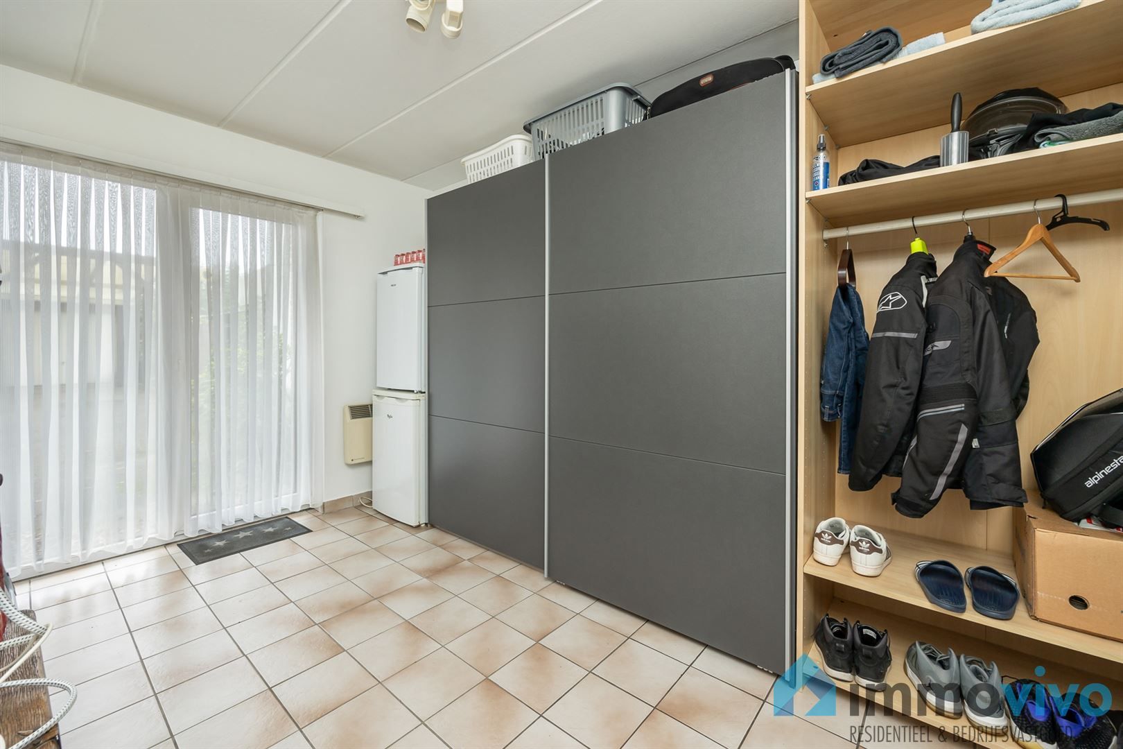 Opbrengsteigendom met 3 appartementen en 3 garageboxen foto 13