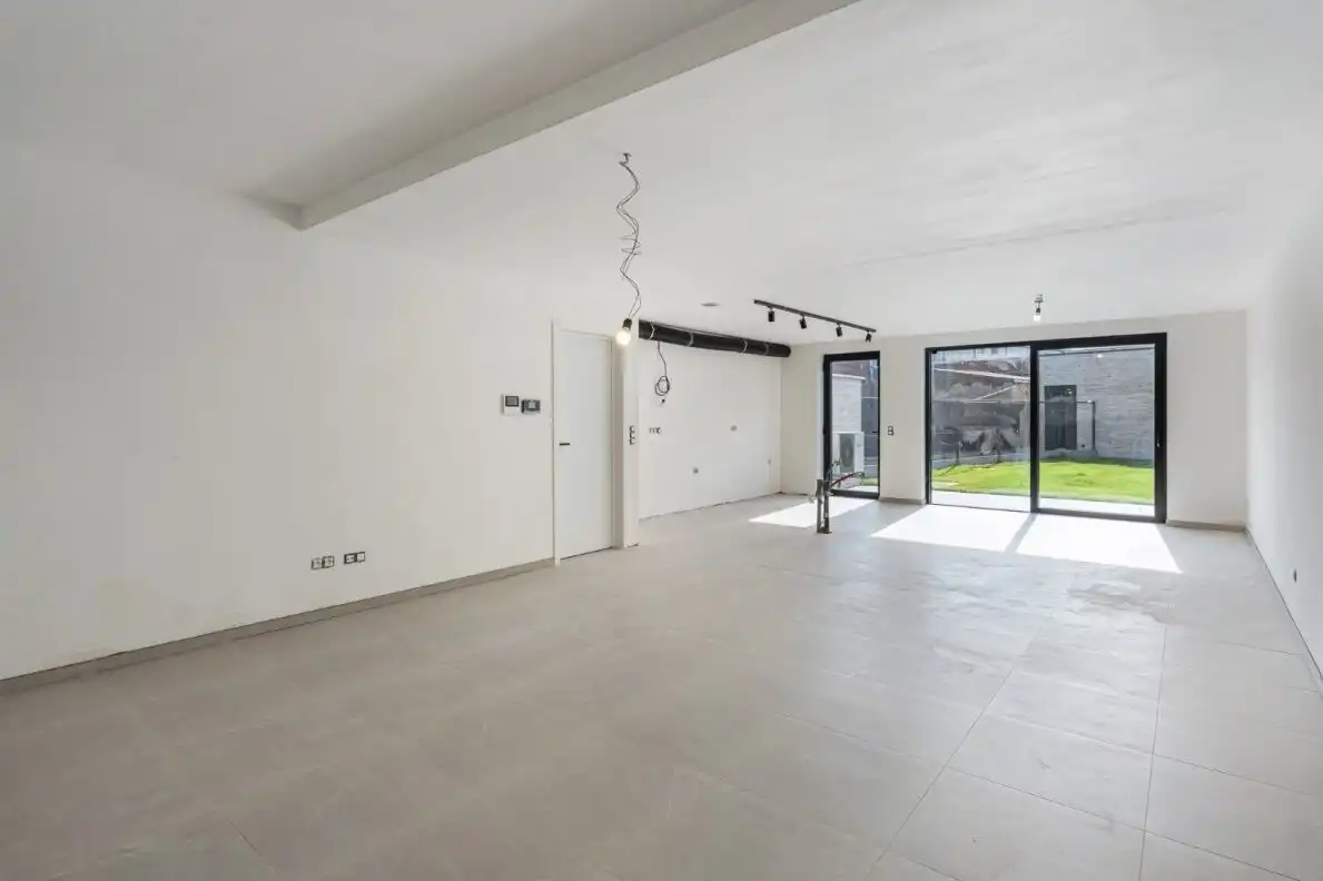 TE KOOP – Ruim nieuwbouw gelijkvloers appartement met tuin en garage in het centrum van Helchteren foto 5