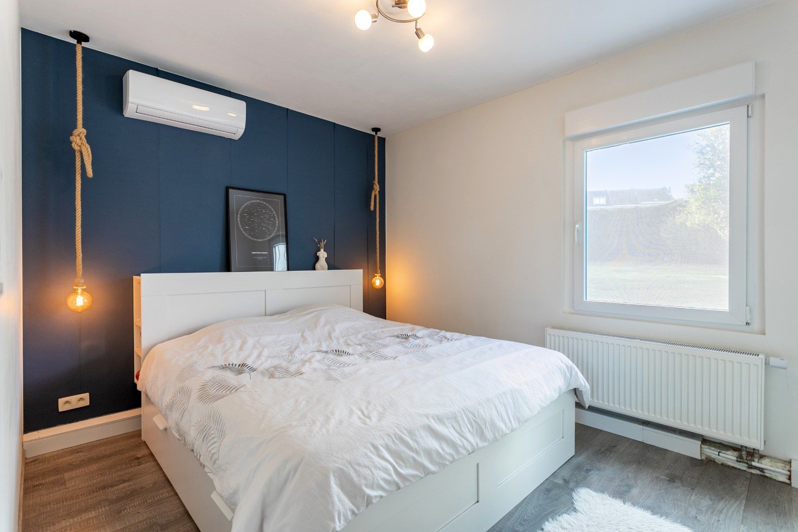 Rustig gelegen halfopen woning met tuin en garage foto 12