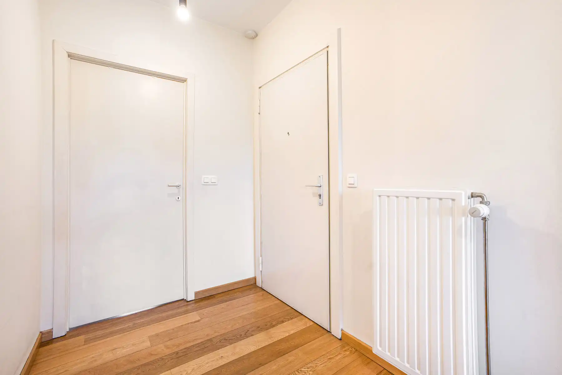 Appartement met 2 slaapkamers, terras, kelder en staanplaats foto 2