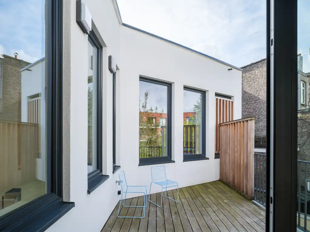 Uniek townhouse-appartement met o.m. 4 slaapkamers, 3 badkamer en een ruim terras. foto 14