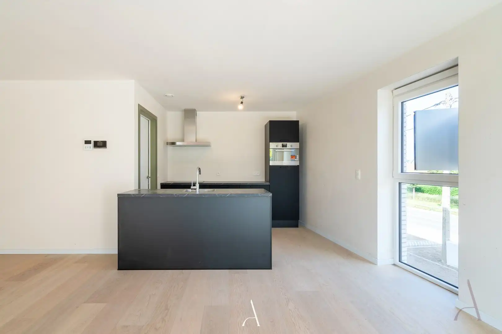 Te huur - Recent en energiezuinig 2-slaapkamerappartement met ondergrondse autostandplaats foto 6