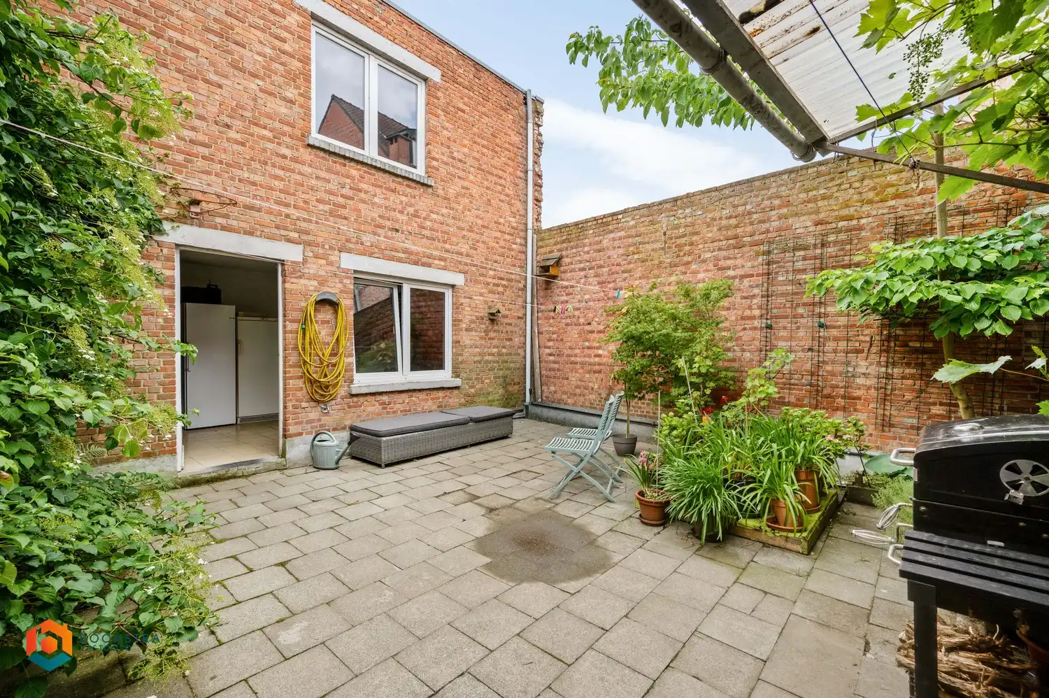Instapklare woning met 4 slpkrs met gezellige stadstuin en garage foto 16