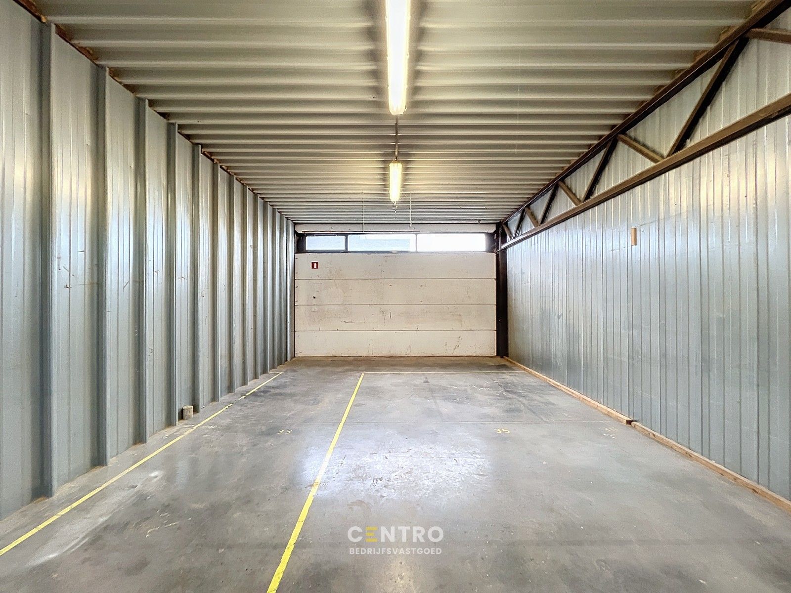 Goed gelegen LOODS (6 x 20m) met sectionaalpoort en geïntegreerde loopdeur. foto 6