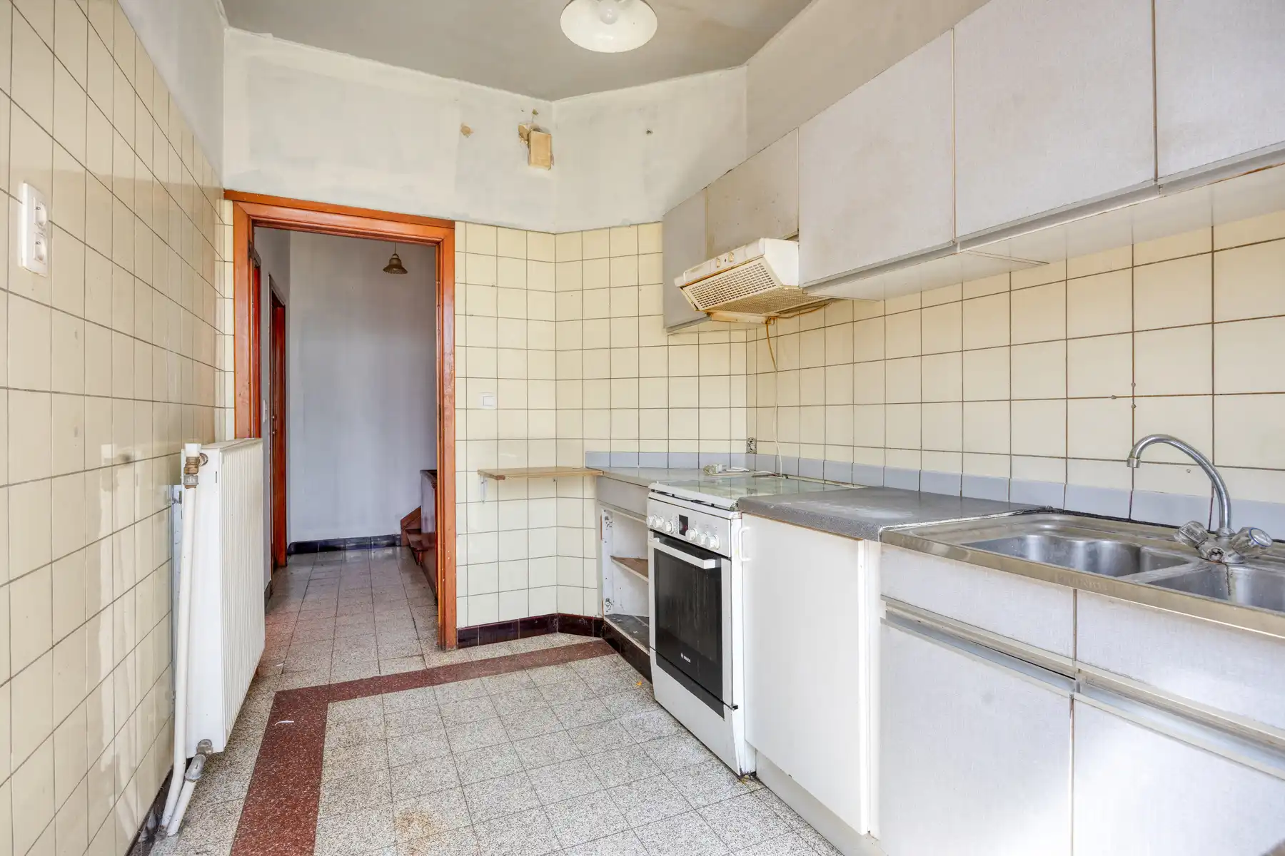 Gunstig gelegen woning met 3 slaapkamers, tuin en garage foto 12