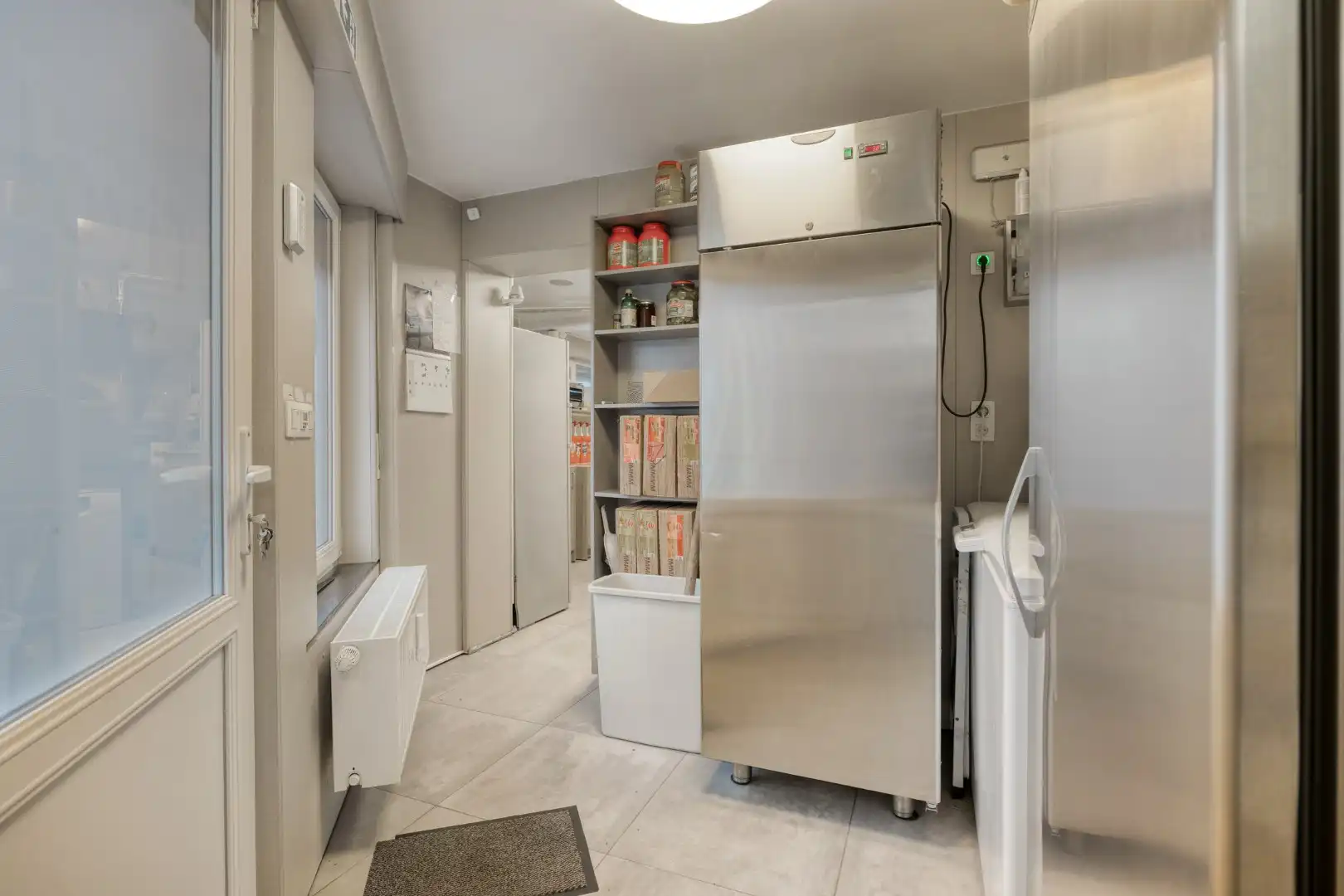 Opbrengsteigendom met handelspand en 3 appartementen te koop in Heverlee op een super ligging! foto 12